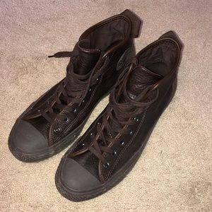 Brown leather converse